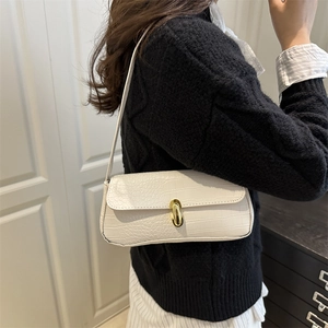 Elegant white crocodile pattern underarm bag with golden oval lock and slim shoulder strap