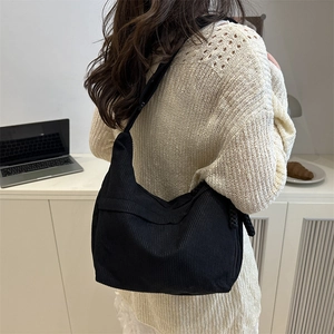 Lightweight black corduroy crossbody hobo bag for women with large capacity design