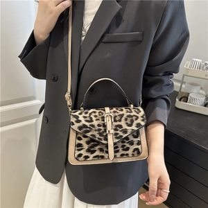 Fashionable leopard print crossbody bag with gold buckle and top handle for women