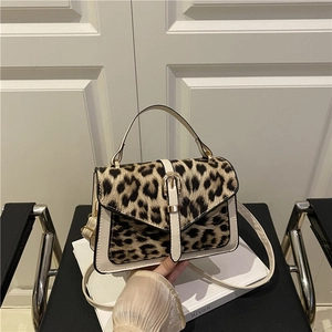 Leopard print crossbody square bag with beige leather trim and gold buckle closure