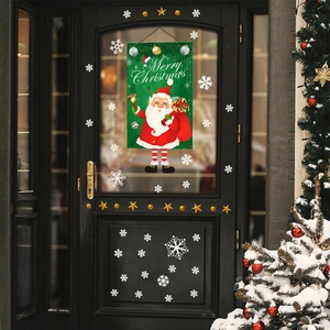 Λεπτομέρεια αυτοκόλλητων Άγιος Βασίλης Merry Christmas σε γυάλινη πόρτα με χιόνι
