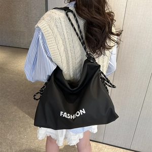 Black large capacity nylon crossbody bag with fashion print and rope shoulder strap