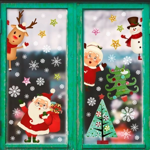 Christmas window stickers set featuring Santa, snowman and reindeer on glass pane