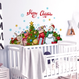 Nursery wall with Christmas tree snowman and rabbit decals for holiday room decor