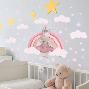 Stickers muraux lapin rose sur arc-en-ciel pour chambre d'enfant avec étoiles et nuages