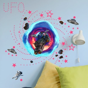 Detailed view of space wall decals featuring a black hole, astronaut and UFO decorations
