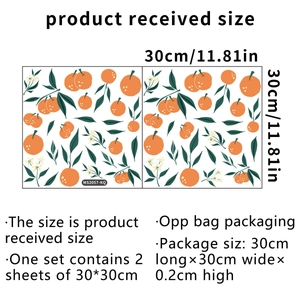 Set of 2 minimalist hand-drawn orange fruit wall stickers measuring 30x30cm each