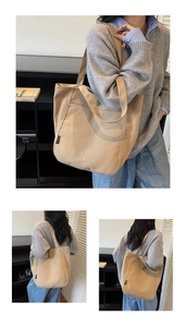 Detail view of khaki canvas tote bag with thick material and fashion side label