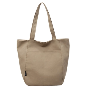 Minimalist khaki canvas tote bag with large capacity and double front pockets for commuting
