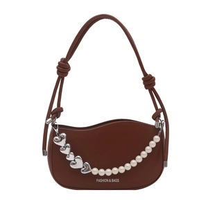 Brown half-moon underarm bag with wave edge, pearl heart chain, and fashion lettering
