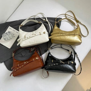Minimalist half-moon shoulder bags in four colors with decorative gold buckle belts