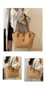 Detailed view of light brown litchi pattern tote bag with gold metal buckle and long straps
