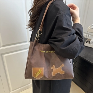 Brown vintage large tote bag with Tidal Dryness lettering for women's daily commute