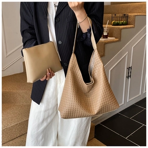 Chic light brown woven tote bag set with matching zipper pouch and textured leather finish