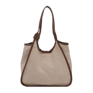 Large beige canvas tote bag with brown trim shown from a centered front perspective