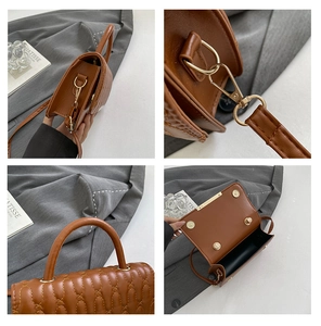 Dettagli della borsa trapuntata marrone con finiture dorate, manico e chiusura magnetica