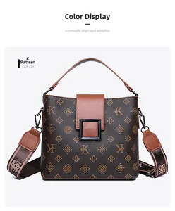 Detail of vintage tote bag featuring K-letter monogram print and wide shoulder strap