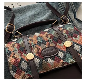 Close-up of bohemian geometric woven fabric texture and premium leather strap on handbag