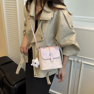 Pink and beige crossbody bag with heart lock, kitten patterns and plush charm