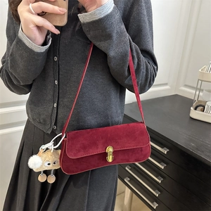 Retro burgundy suede underarm bag with gold lock and cute plush pendant on strap
