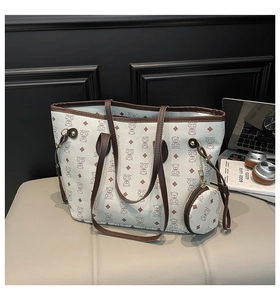 Detail of tote bag set featuring brown bear prints and detachable round coin purse