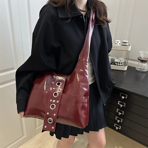 Vintage burgundy rivet tote bag with metallic eyelets and punk style for women