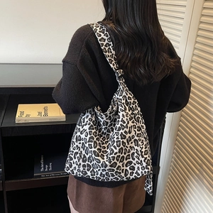 Fashionable leopard print canvas crossbody bag with large capacity and wide strap