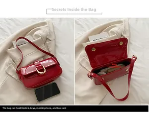 Detail view of red patent leather shoulder bag showing internal capacity and gold hardware