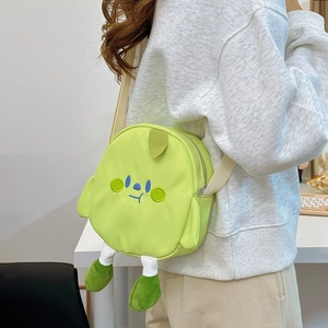 Cute green cartoon canvas crossbody bag with soft legs and shoulder strap for girls