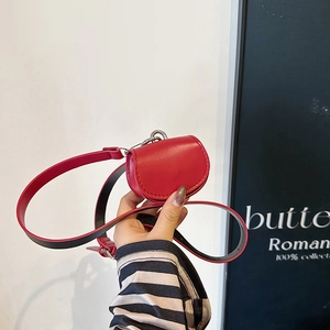 Red mini semi-circle crossbody bag for lipstick with dual-color strap and top stitching