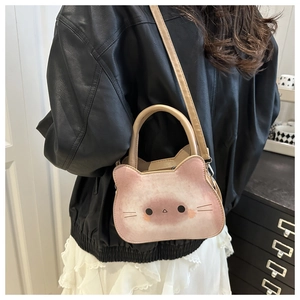 Detail of cute cat shaped toast crossbody bag with adjustable strap and plush texture