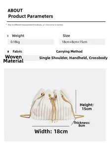 Detail view of white corduroy bucket bag with pearl chain and product dimensions