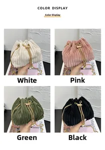 Chic velvet bucket bag color display in white, pink, green, and black with pearl charms