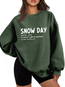 Detail of forest green oversized sweatshirt with white snow day dictionary print