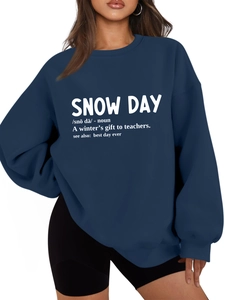 Detail of Snow Day text print on navy blue heavy cotton crewneck sweatshirt