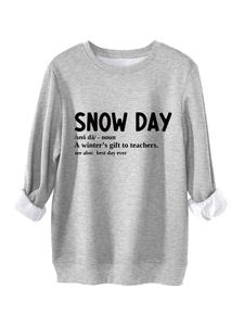 Detail of light grey fleece sweatshirt showing soft inner lining and snow day print