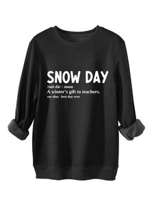 Close-up of thick grey plush lining on black crewneck sweatshirt with Snow Day print