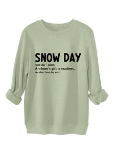 Close-up of light green fleece sweatshirt with Snow Day dictionary style print