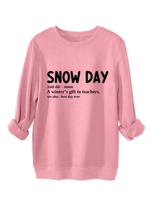 Detailed view of pink crewneck sweatshirt with SNOW DAY creative text print and ribbed cuffs