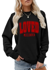 Detail of black crewneck sweatshirt with red LOVED print and John 3:16 bible verse