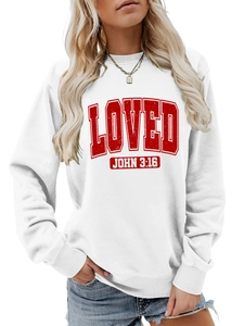 Close-up of LOVED JOHN 3:16 red text print on white crewneck sweatshirt detail
