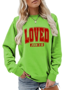 Detail view of green crewneck sweatshirt with red LOVED JOHN 3:16 text print design