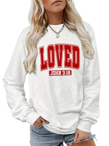 Detail of red Loved John 3:16 text print on white long sleeve crewneck sweatshirt for women