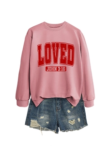 Pink sweatshirt with red Loved John 3:16 print paired with ripped denim shorts set
