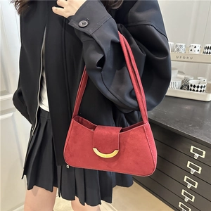 Deep red suede shoulder bag for women with golden buckle and vintage minimalist style