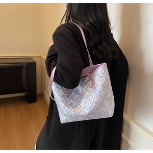 Detail of New Chinese ethnic pattern tote bag with purple straps and geometric floral design