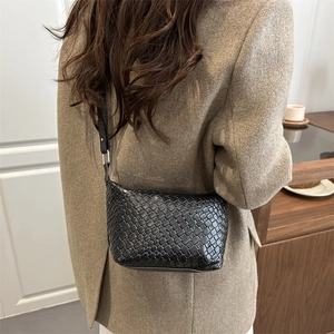 Minimalist black woven crossbody hobo bag for women with adjustable leather shoulder strap