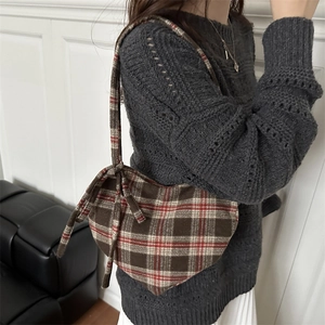 Brown and red plaid heart-shaped crossbody bag with bow accents for autumn style