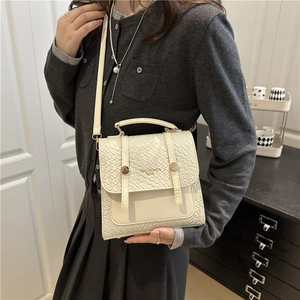 Elegant cream quilted convertible backpack for women with gold buckles and dual straps
