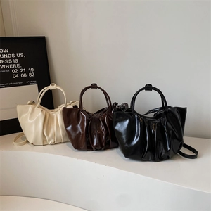 French style pleated cloud bag in cream, brown, and black with shiny finish